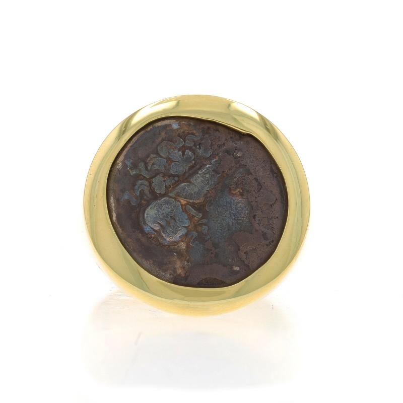 Taille : 7
Frais de taille : Up&Up pour 100 $ ou Down pour 80 $.

Design :  Pièce de monnaie grecque ancienne

Contenu du métal : Or jaune 18k et argent

Style : Bague d'affirmation en forme de pièce de monnaie
Thème : Apollo

Mesures

Hauteur de la