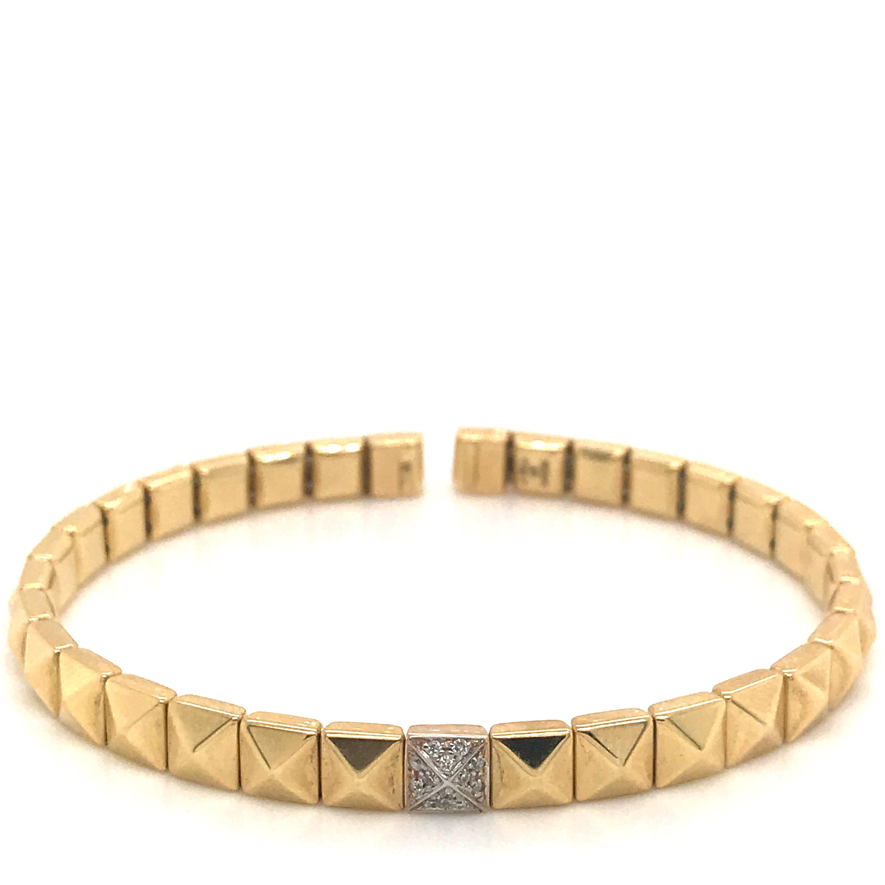 Yellow Gold Flexible Bracelet 18 K pyramid shape.
Weight Gold 10.20
Diamond 0.60 ct Color G
Worn alone or overlapped for a personal mix & match game, Stretch Spring jewels define a minimalist and decisively, featuring refined details to complete an