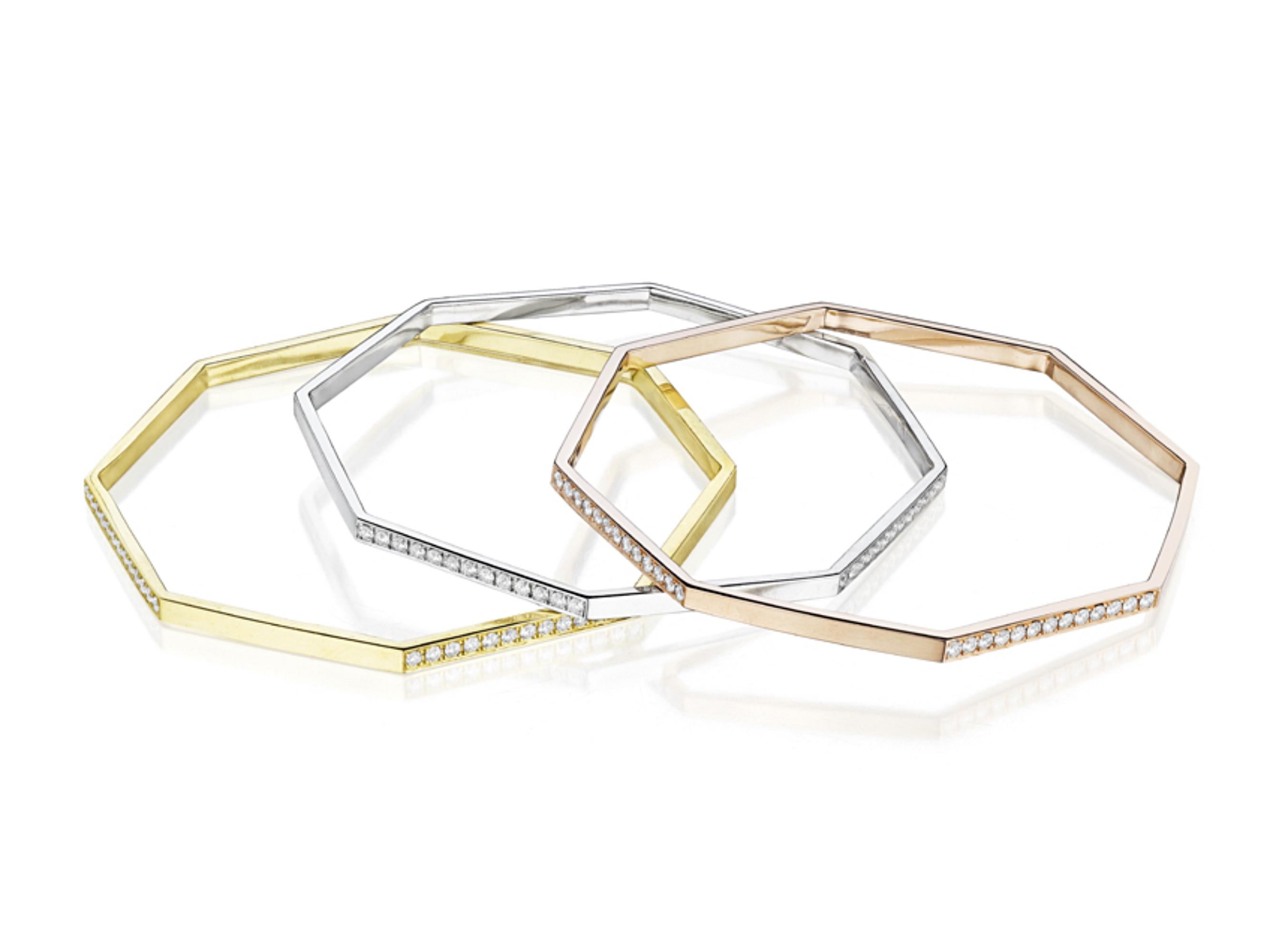 Specs: 18k Yellow Gold hexagon shaped bangle with White Diamonds. 

Story:  A self-described minimalist with a substantial background in fashion and art, Kerri Halpern created MadStone in 2010 as part of her lifelong quest to find the perfect