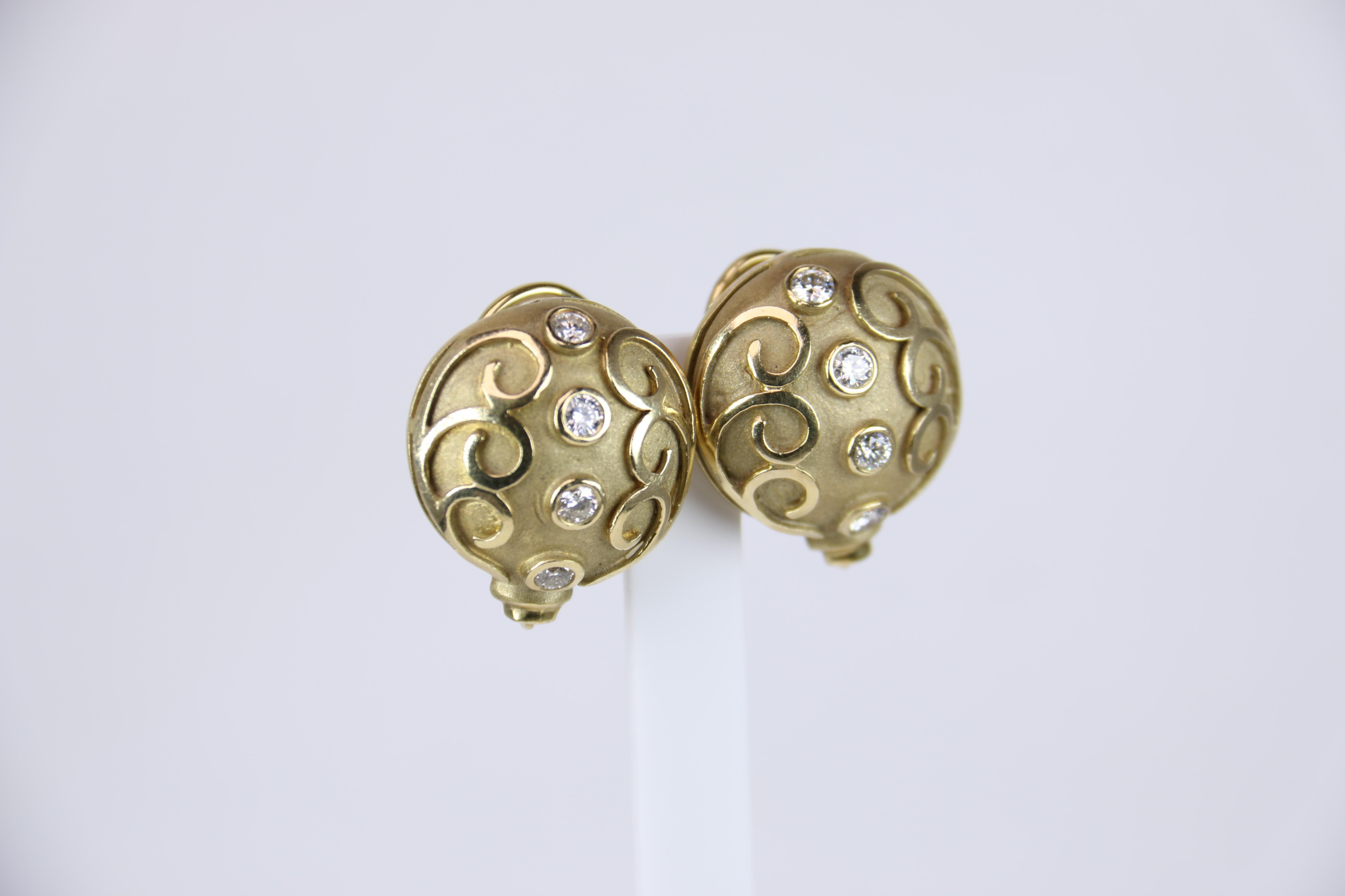 Round Earrings with Design Detail of Swirl in 18K Yellow Gold and Diamonds.  These earrings are made for pierced ears.  A definite gorgeous statement earring.  