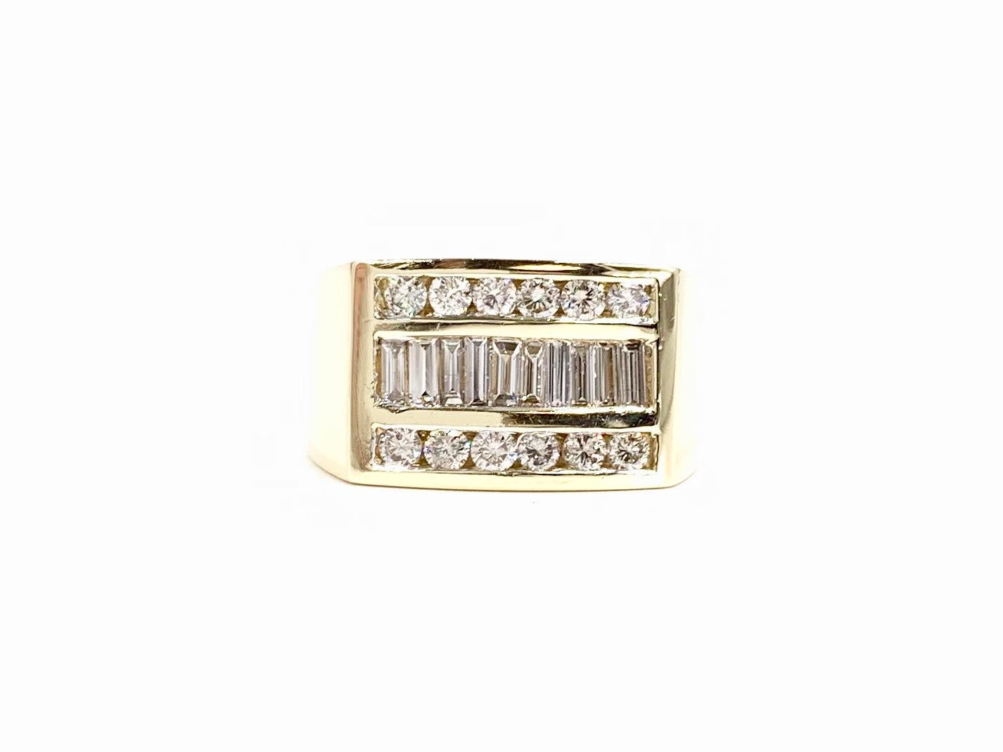 A well made and cleanly designed polished 14 karat yellow gold three row diamond gents ring featuring 12 round brilliant and 10 baguette cut diamonds at approximately 1.10 carats total weight. Diamond quality is approximately G-H color, SI1-SI2