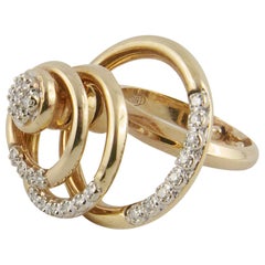 Dreieckiger Ring aus Gelbgold und Diamanten mit Spinn