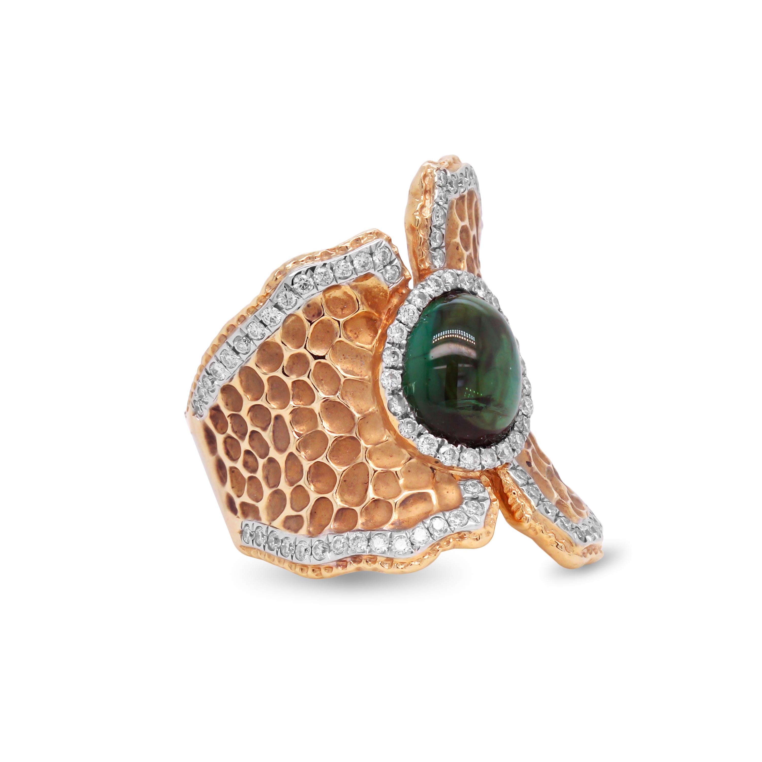 18K Yellow Gold and Diamond Wide Cocktail Ring with Cabochon Green Tourmaline Center

This unique ring features an incredible design pattern all throughout the ring with diamonds set on the edges and surrounding the Tourmaline center

0.94 carat G