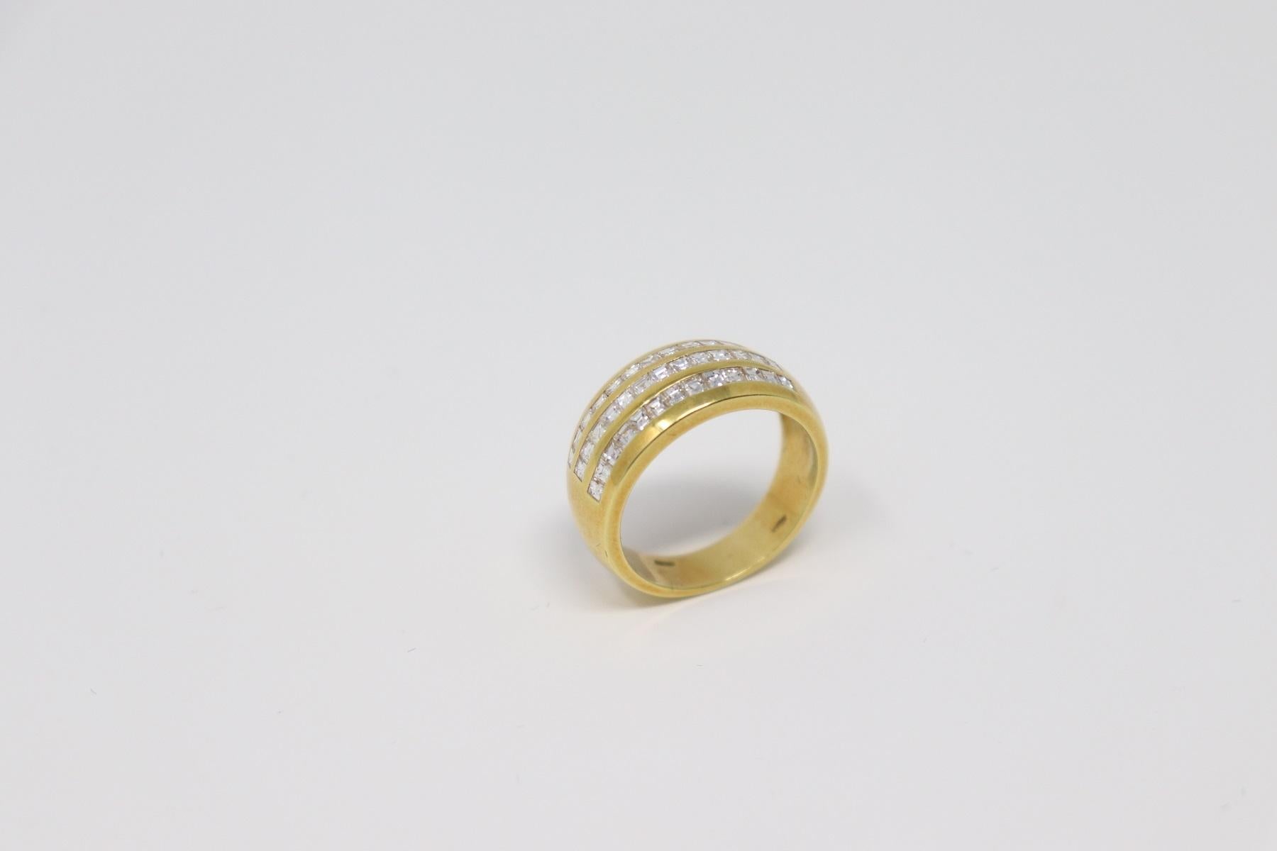 18 Karat yellow gold ring with diamonds carré cut total about 1.50 Carats. 
Total weight: about 9.30 g.
New contemporary jewelry. Produced in the famous Italian city of gold Valenza. 
Ring size Italian 17.50 please see the conversion in the table in