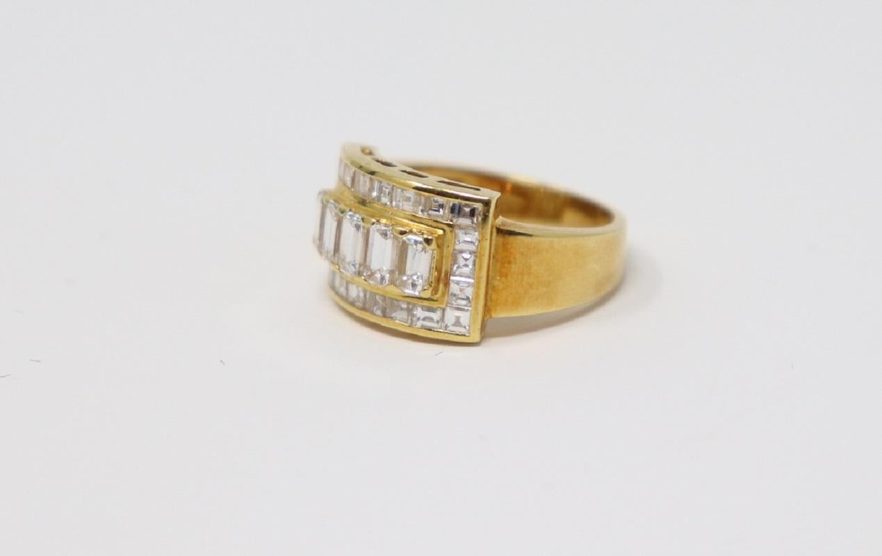 18 Karat yellow gold ring with carré cut diamonds total about 2.50 Carats. 
Total weight: 6.70 g.
New contemporary jewelry. Produced in the famous Italian city of gold Valenza. 
Ring size Italian 13 please see the conversion in the table in the