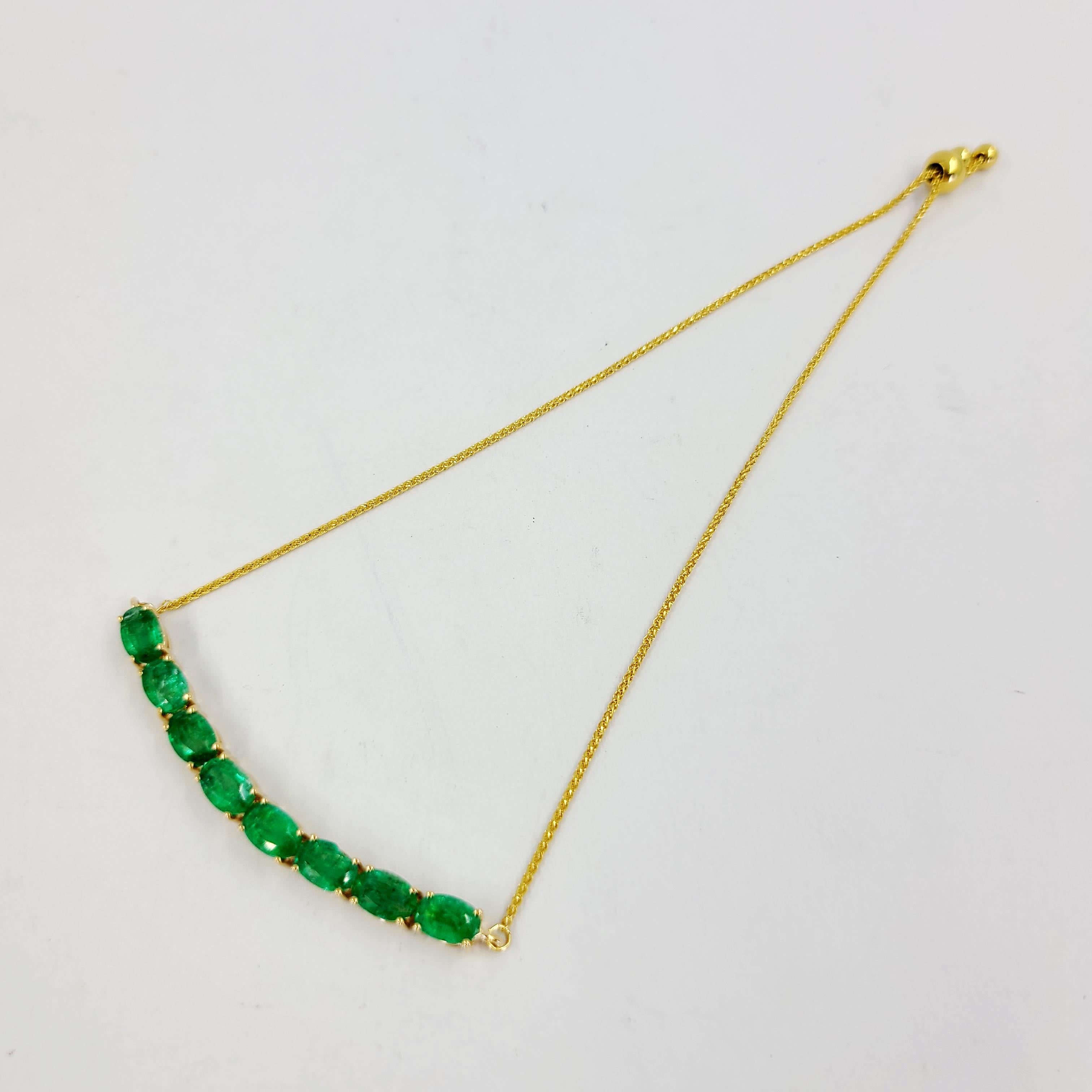 Yellow Gold and Emerald Bolo Bracelet In Good Condition For Sale In Coral Gables, FL