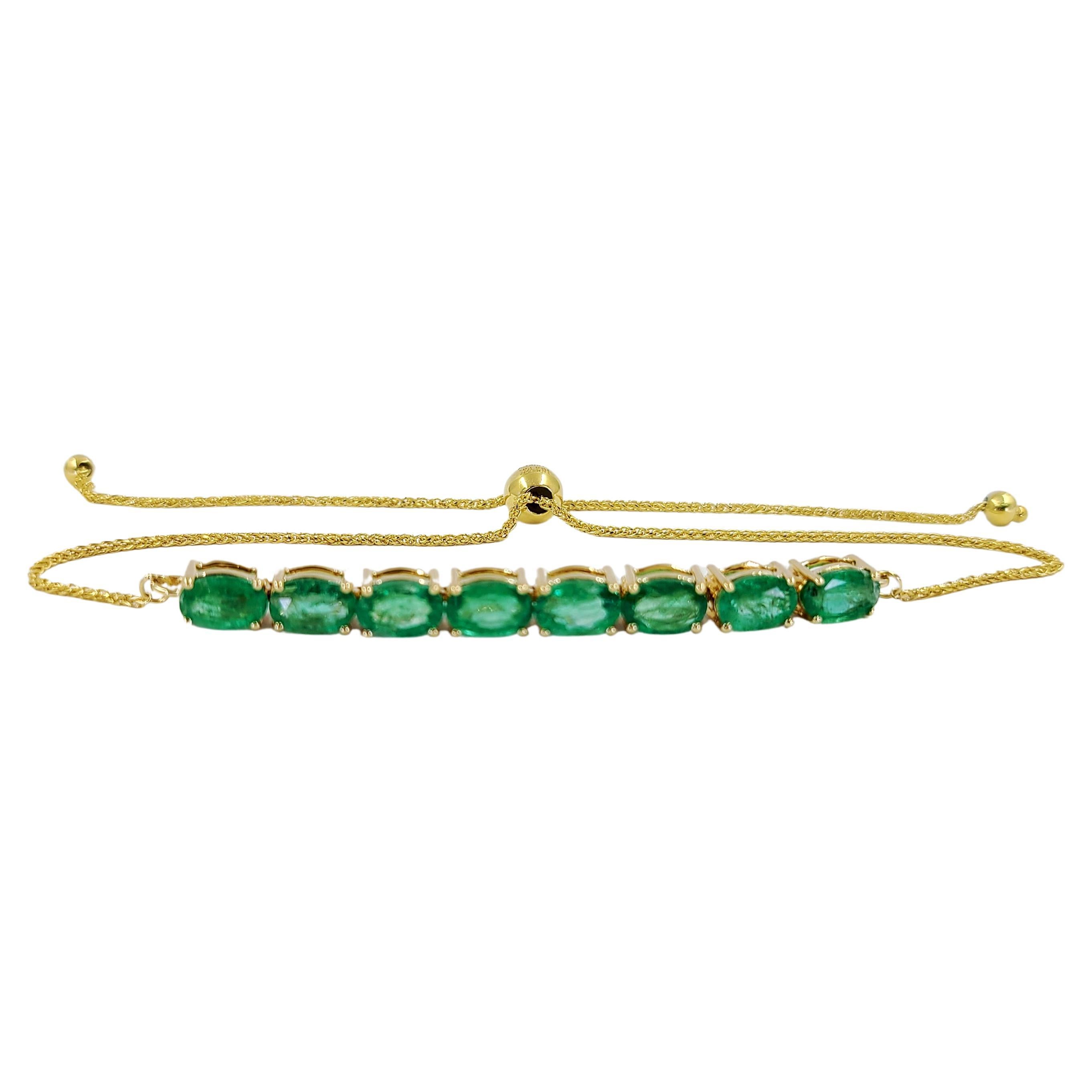 Yellow Gold and Emerald Bolo Bracelet For Sale