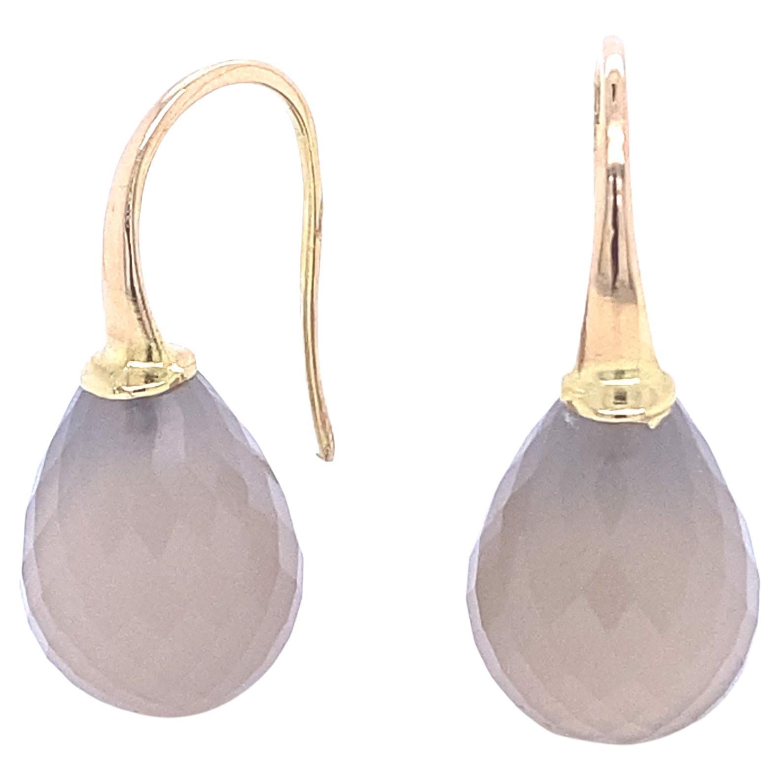Discover these magnificent 18-carat yellow gold dangling earrings, adorned with gray agates, from the French collection of Mesure et Art du Temps. These earrings are a true jewel of elegance and sophistication, bringing a touch of brilliance and