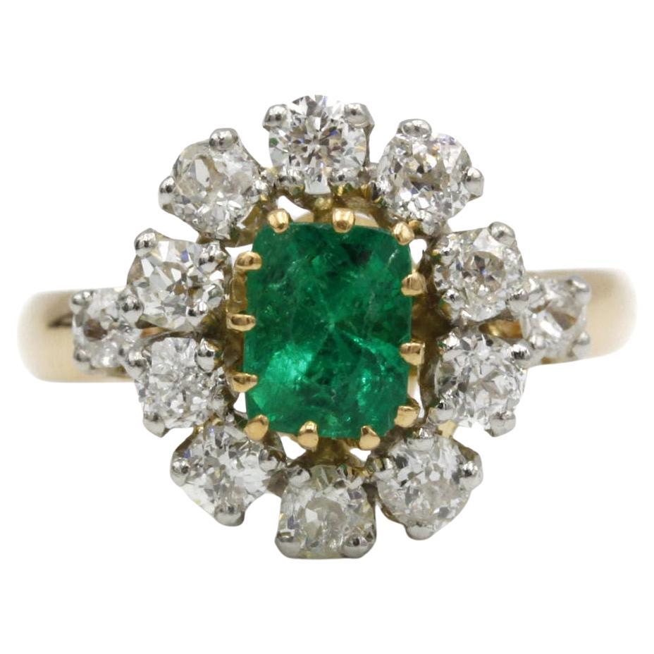 Yellow Gold and Platinum Daisy Ring with Emerald and Diamonds