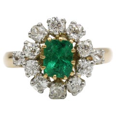 Yellow Gold and Platinum Daisy Ring with Emerald and Diamonds