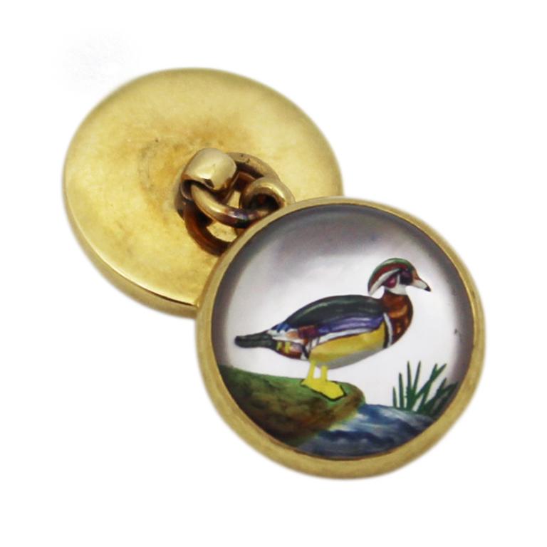 Circa 1950s 14K yellow Gold 2 sided Cufflinks, measuring 9/16 inch in diameter and featuring on each side a finely deep carved very colorful and detailed Essex Crystal of Ducks and Mallards. Backed by mother of Pearl to give them better dimension. 