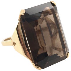 Anello in oro giallo e quarzo fumé