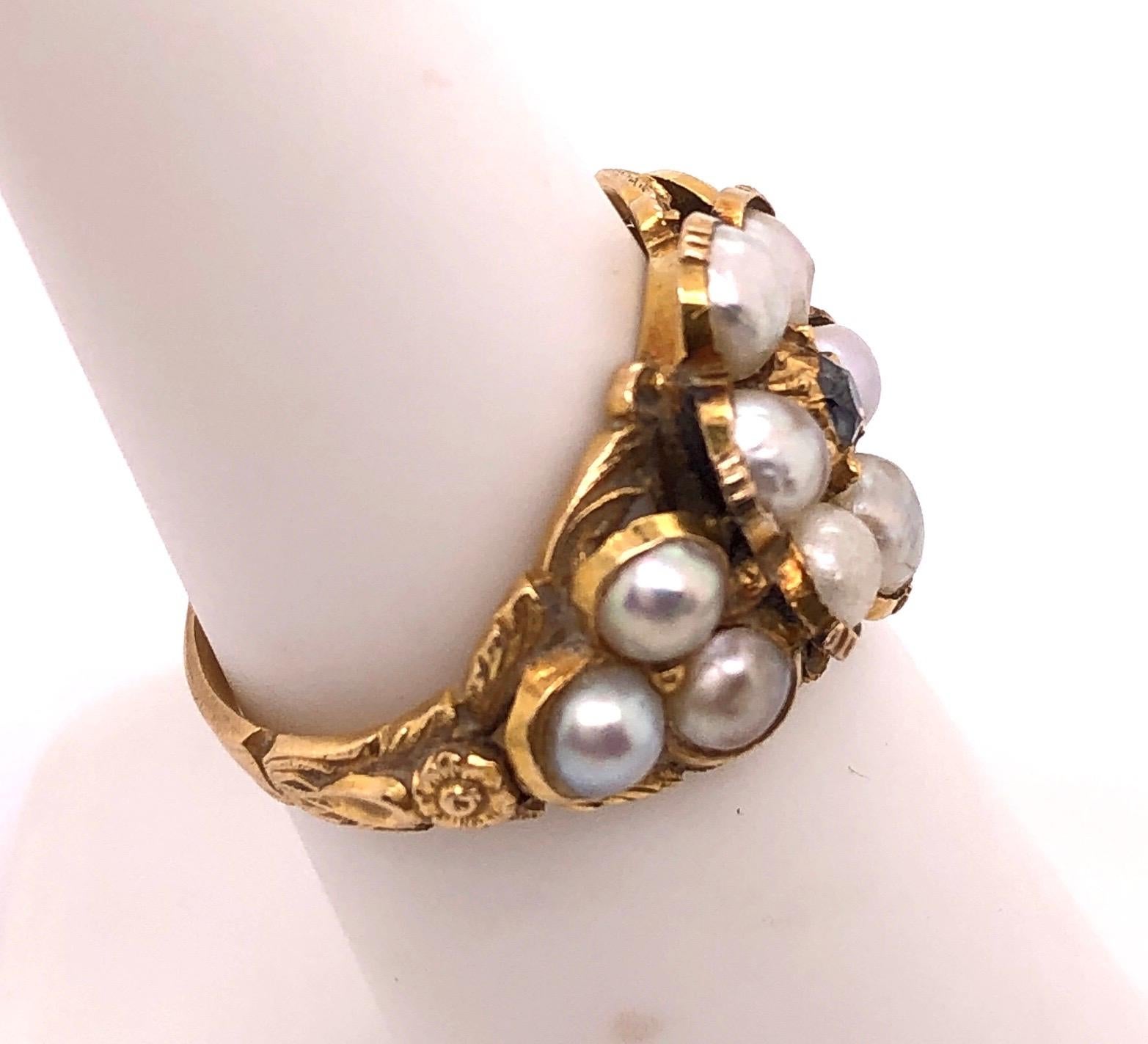 Yellow Gold Antique Cluster of Pearl Ring with Round Diamond. Ring size 6.Pearls measure 4.5mm. .10TDW The face of the ring measures 21mm by 15mm. 