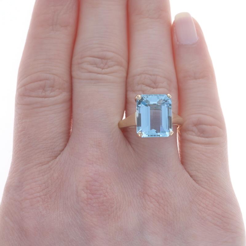 Size: 8
Sizing Fee: Up 2 sizes for $35 or Down 1 size for $35

Metal Content: 14k Yellow Gold

Stone Information

Natural Aquamarine
Treatment: Heating
Carat(s): 7.21ct
Cut: Emerald
Color: Blue

Total Carats: 7.21ct

Style: Cocktail