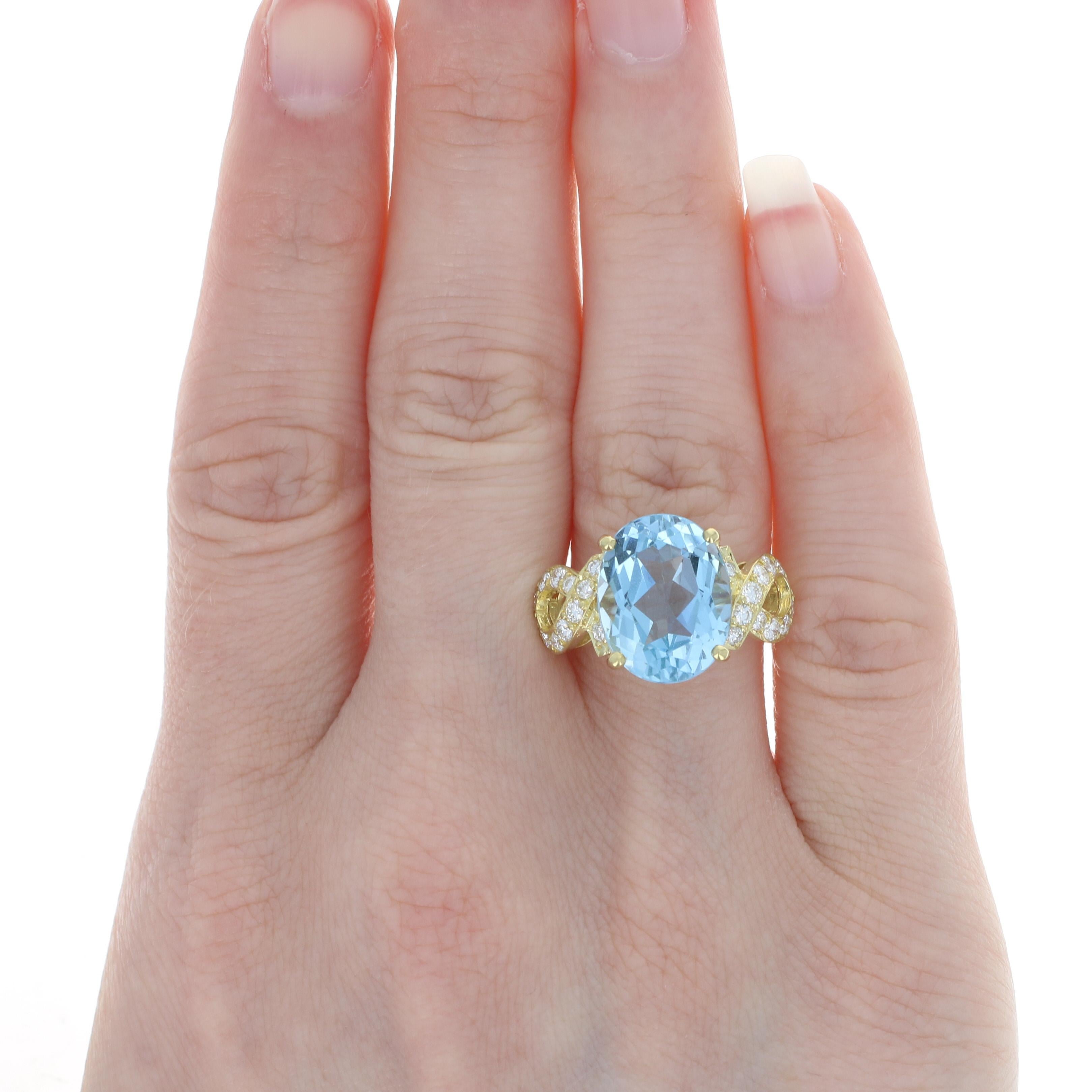 Oval Cut Yellow Gold Aquamarine and Diamond Ring, 18 Karat Oval Brilliant Cut 7.23 Carat