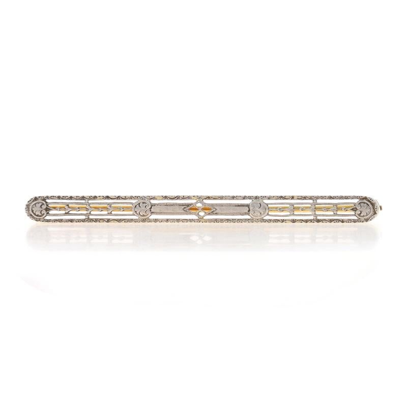 Era: Art Deco
Date: 1920s - 1930s

Metal Content: 14k Yellow Gold & Platinum (top)

Style: Bar Brooch
Fastening Type: Hinged Pin and Locking C-Clasp
Features: Filigree & Milgrain Detailing

Measurements
Tall: 3/16