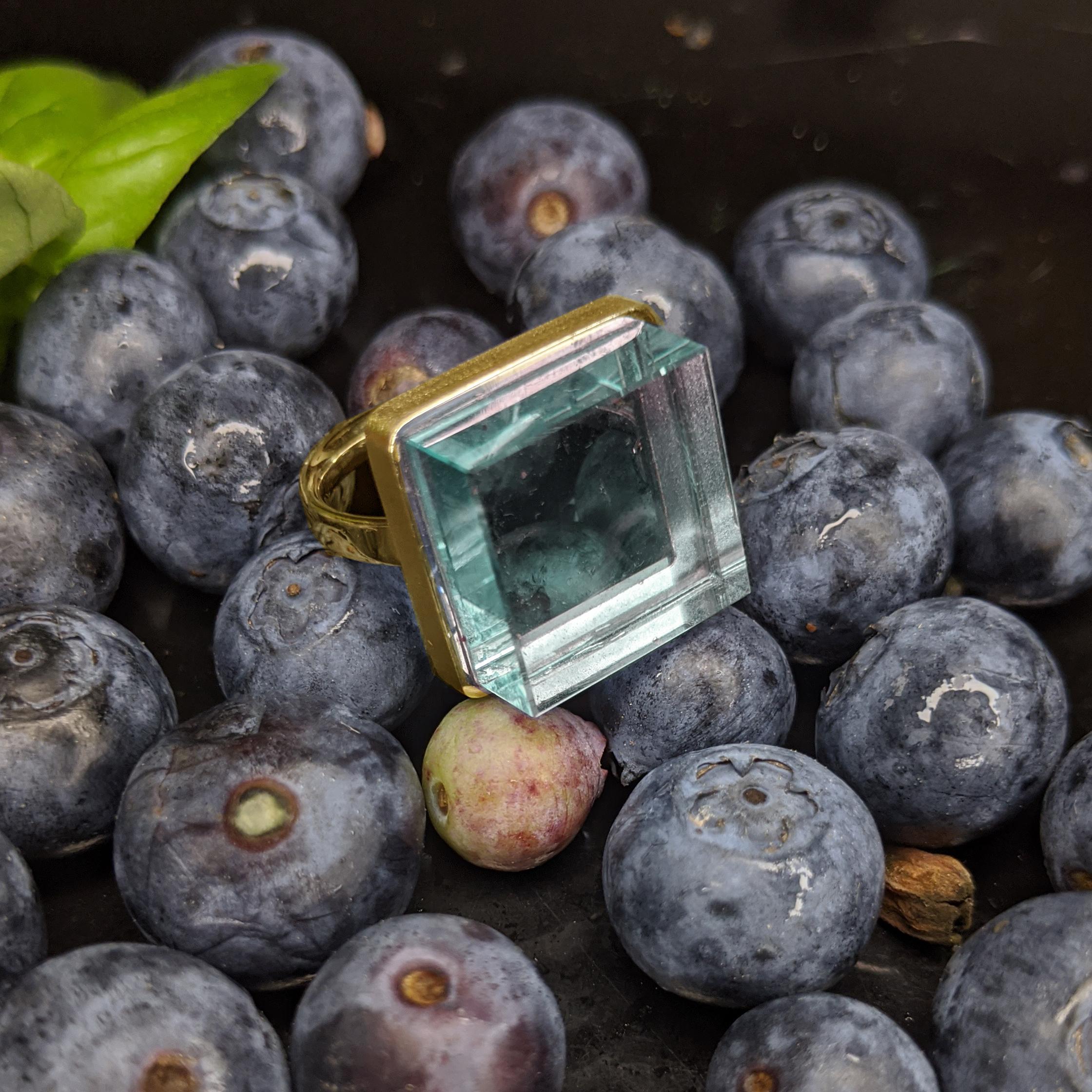 This stunning ring is made of 14 karat yellow gold and boasts a vibrant 15x15x8 mm light green quartz. It has been featured in prestigious publications such as Harper's Bazaar and Vogue UA.

This ring is not only a beautiful piece of jewellery, but