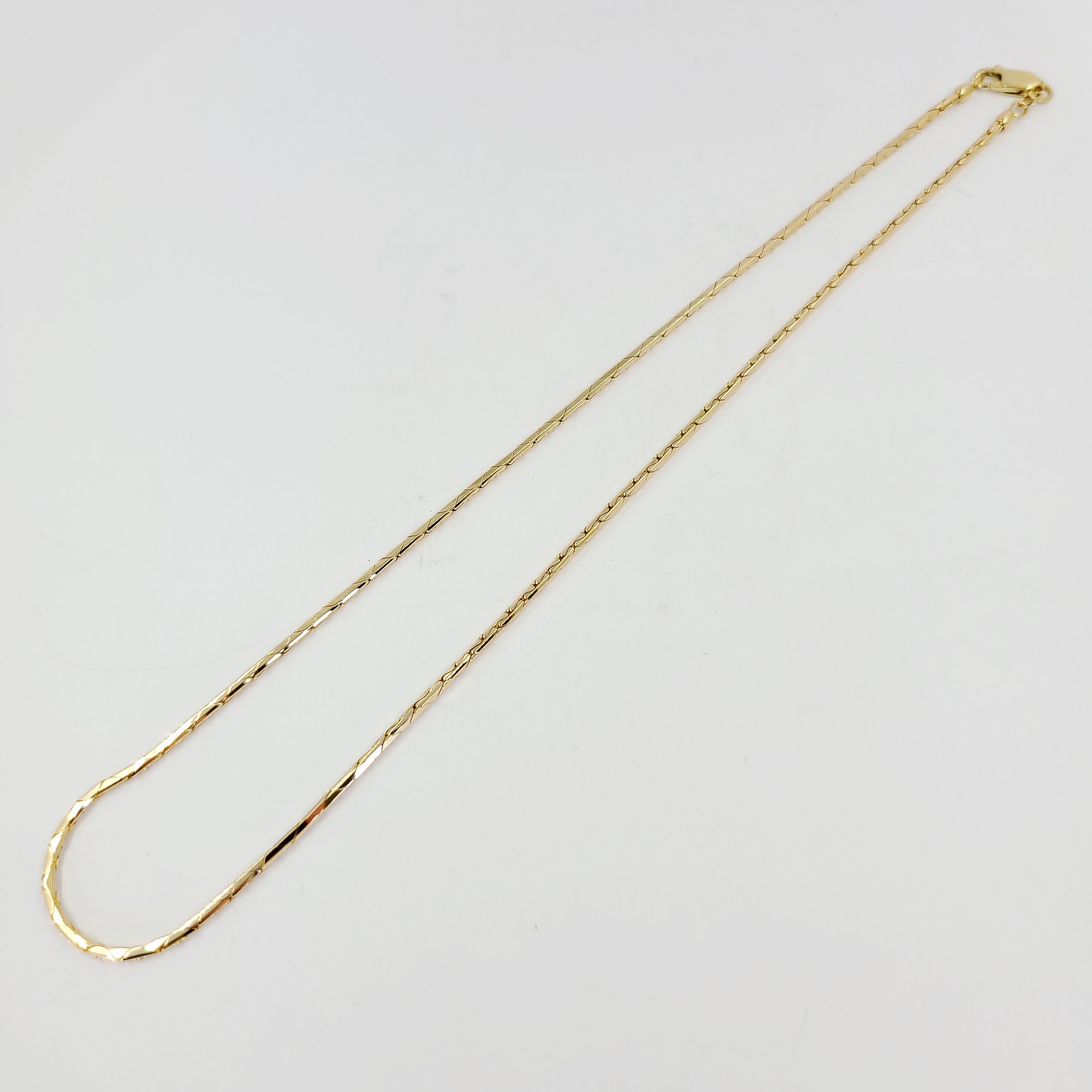 14 Karat Yellow Gold Articulated High Polish Chain Measuring 1.7mm Wide & 16 Inches Long. Lobster Clasp Closure. Finished Weight Is 10.5 Grams.