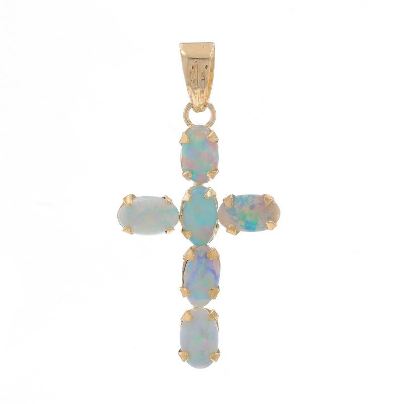 Metal Content: 14k Yellow Gold

Stone Information

Natural Australian Opals
Carat(s): .48ctw

Total Carats: .48ctw

Theme: Cross, Faith

Measurements

Tall (from stationary bail): 27/32