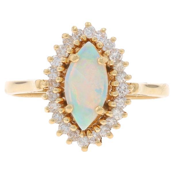 Bague halo d'opales australiennes et de diamants en or jaune 14 carats cabochon marquise 1,06 carat