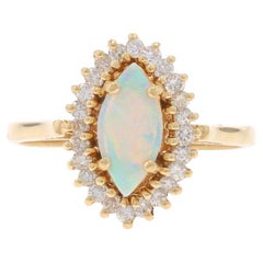 Bague halo d'opales australiennes et de diamants en or jaune 14 carats cabochon marquise 1,06 carat