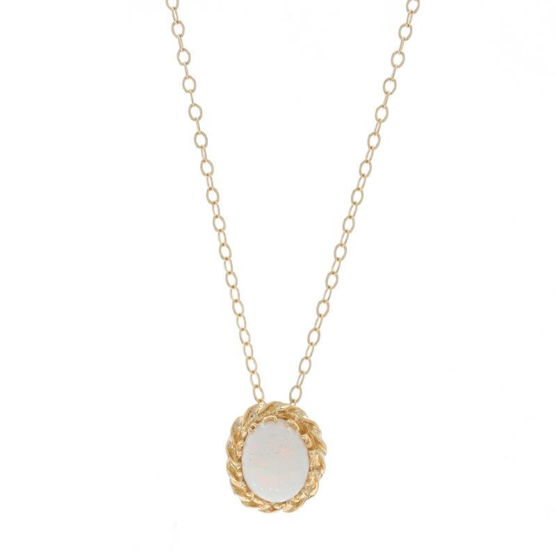 Metal Content: 14k Yellow Gold

Stone Information

Natural Australian Opal
Carat(s): .80ct
Cut: Oval Cabochon

Total Carats: .80ct

Style: Solitaire
Chain Style: Flat Cable
Necklace Style: Chain
Fastening Type: Spring Ring Clasp

Measurements

Tall