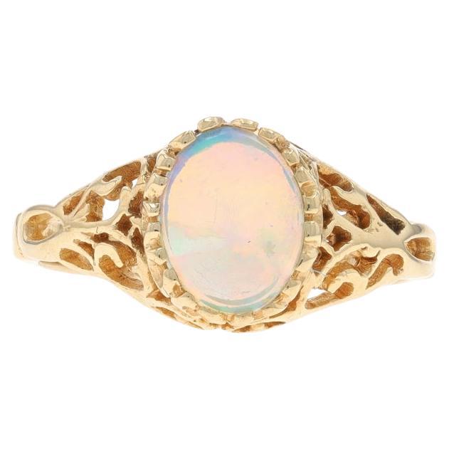 Bague solitaire en or jaune avec opale australienne - 10k Cabochon ovale .80ct