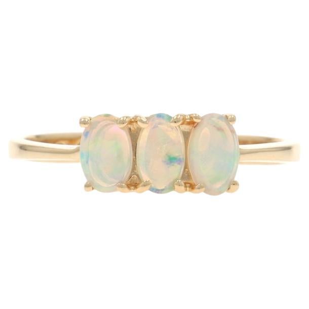 Yellow Gold Australian Opal Three-Stone Ring - 14k Oval Cabochon .54ctw For Sale