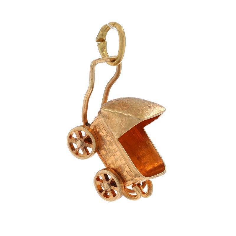 Metal Content: 10k Yellow Gold

Theme: Baby Carriage, Infant Pram Stroller
Features: Wheels Rotate

Measurements

Interior of top bail opening measures (east to west): 1.8mm
Tall (from handle to front of carriage): 13/16