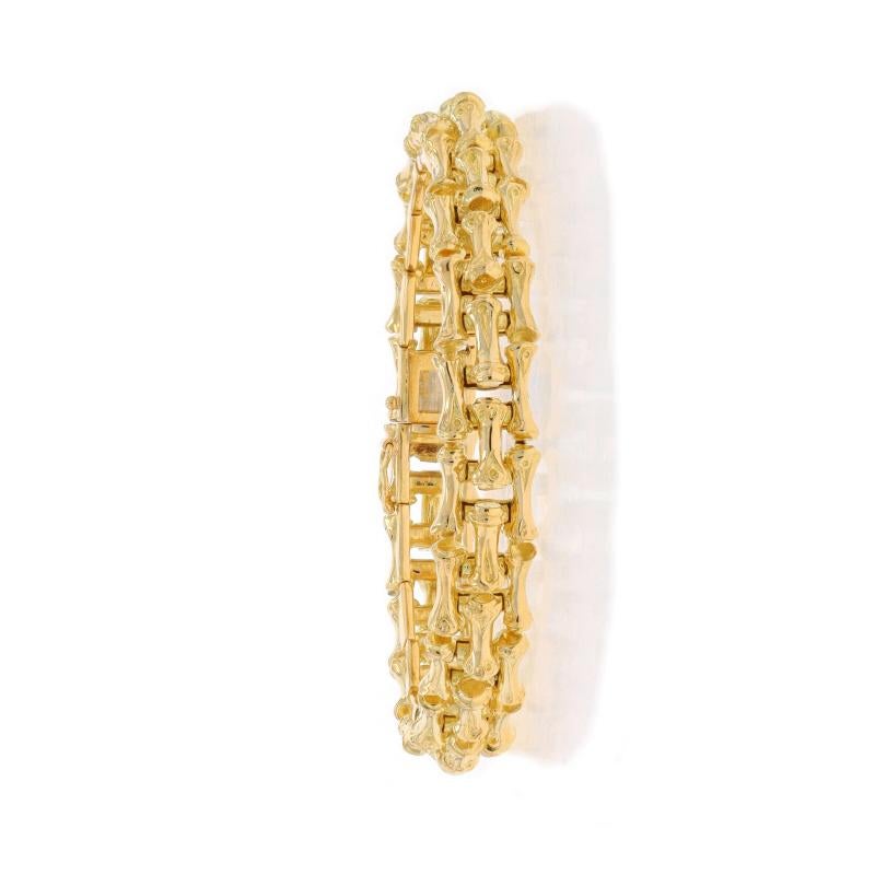 Metal Content: 18k Yellow Gold

Style: Link
Fastening Type: Tab Box Clasp with One Side Safety Clasp
Theme: Bamboo, Woven Botanical

Measurements

Length: 7