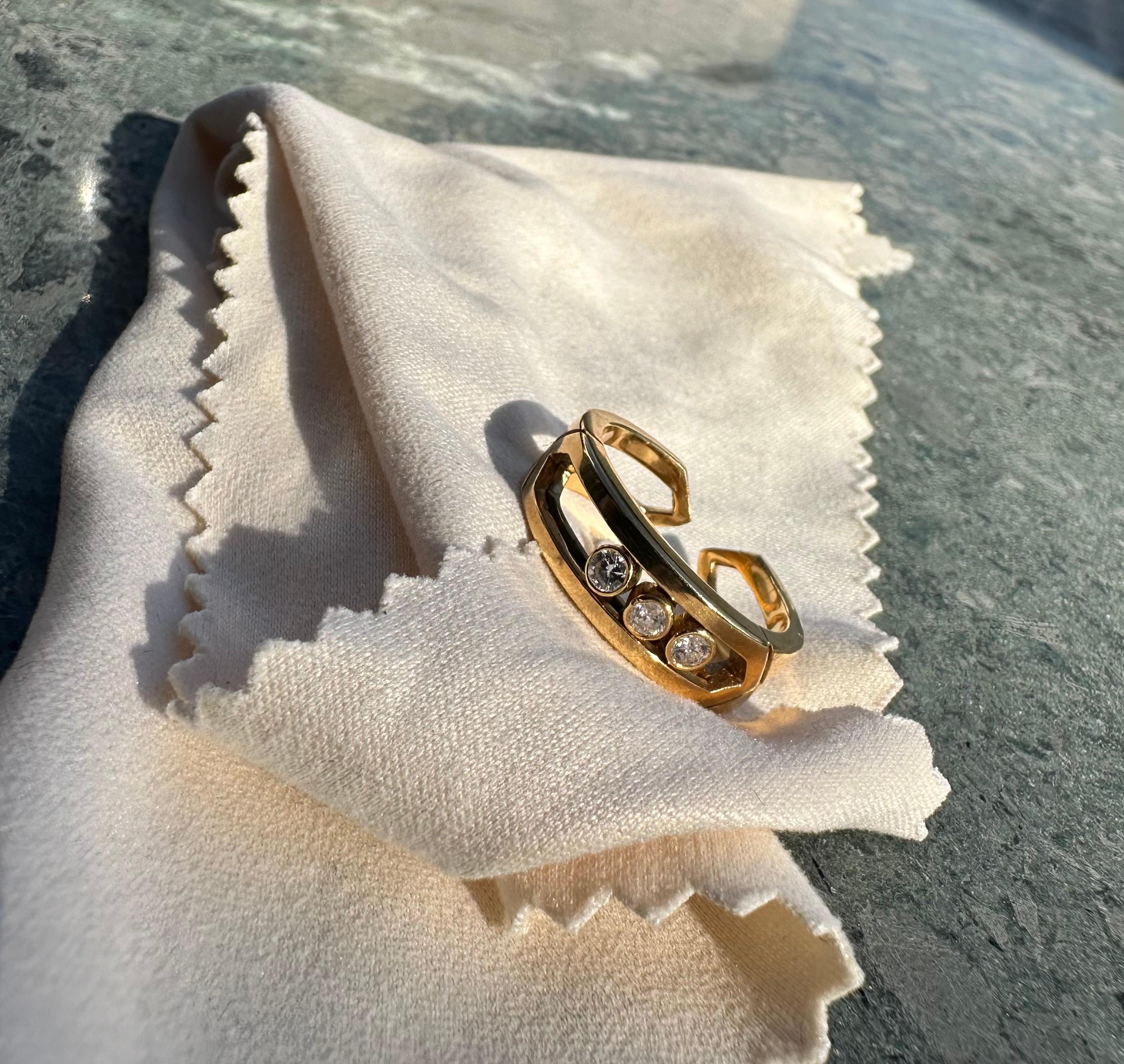 A Ring set in Yellow Gold and with 3 