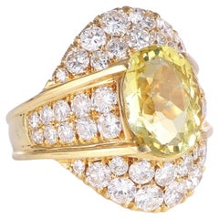 Bandring aus Gelbgold mit weißen Diamanten und Heliodor
