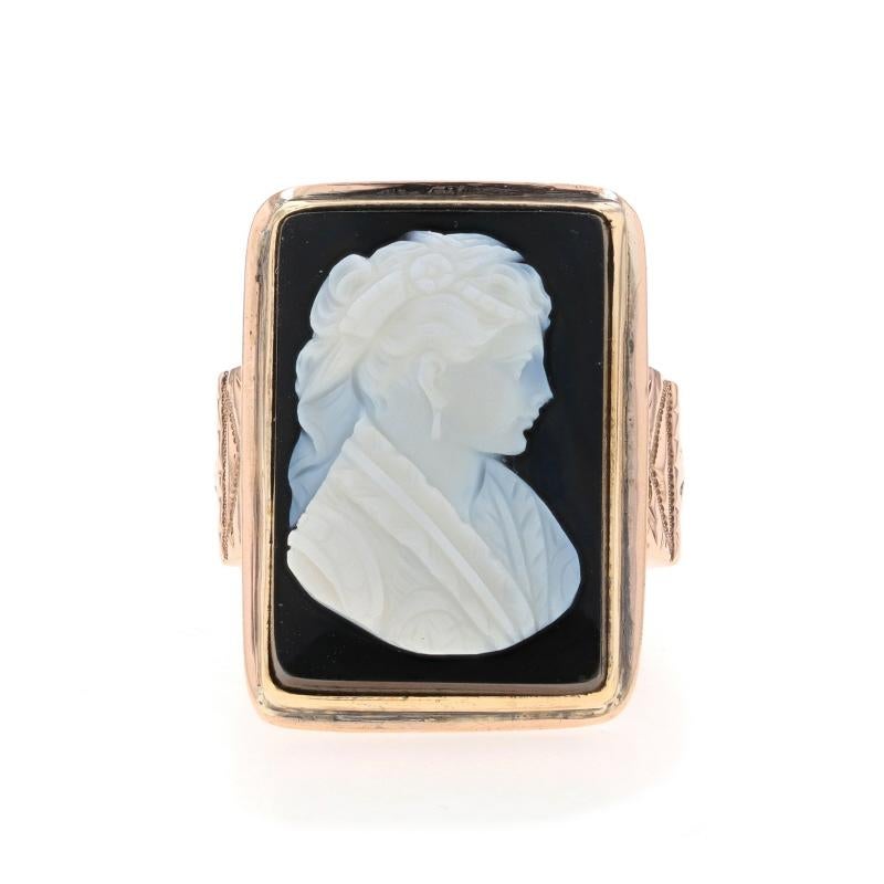 Size: 8 1/2
Sizing Fee: Up 2 sizes for $80 or Down 1 size for $50

Era: Victorian
Date: 1879

Metal Content: 10k Yellow Gold

Stone Information

Natural Banded Agate Hardstone
Cut: Carved Cameo
Color: Black & White
Size: 21.4mm x 14.6mm

Style: