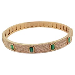 Yellow Gold Bangle Bracelet with Diamonds and Emeralds