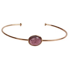 Yellow Gold Bangle Set with a Purple Tourmaline Created by Marion Jeantet