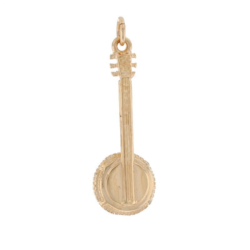 Metal Content: 14k Yellow Gold

Theme: Banjo, Stringed Instrument, Musician's Gift

Measurements

Tall (from stationary bail): 1 3/16