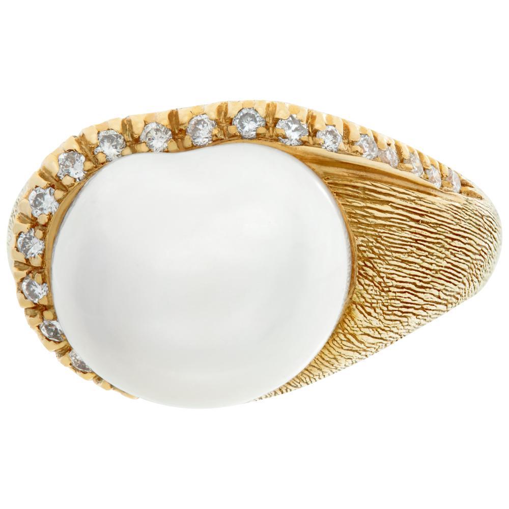 Baroque fresh water pearl (13 x 13.5mm) & diamonds ring in 18K yellow gold. Round brilliant cut diamonds total approx. weight: 0.28 carat, estimate: G-H color, VS clarity. Size 8.5.This Pearl/diamond ring is currently size 8.5 and some items can be