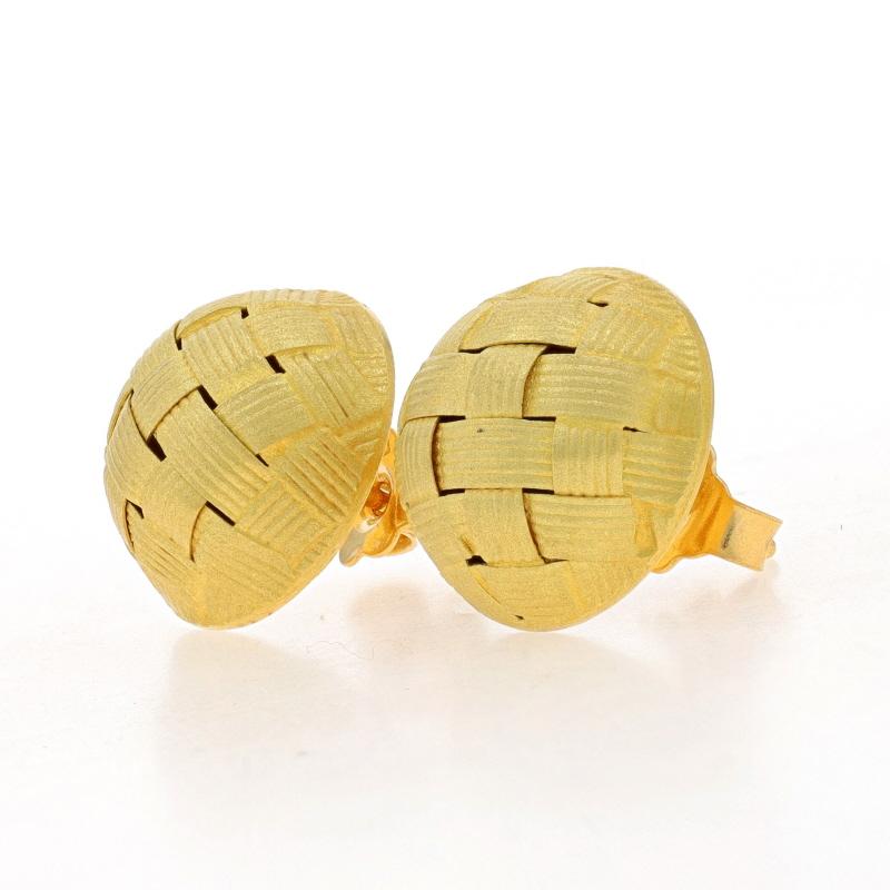 Metal Content: 18k Yellow Gold

Style: Large Dome Stud
Fastening Type: Butterfly Closures
Theme: Basketweave
Features: Smooth & Matte Finishes with Etched Detailing

Measurements
Tall: 9/16