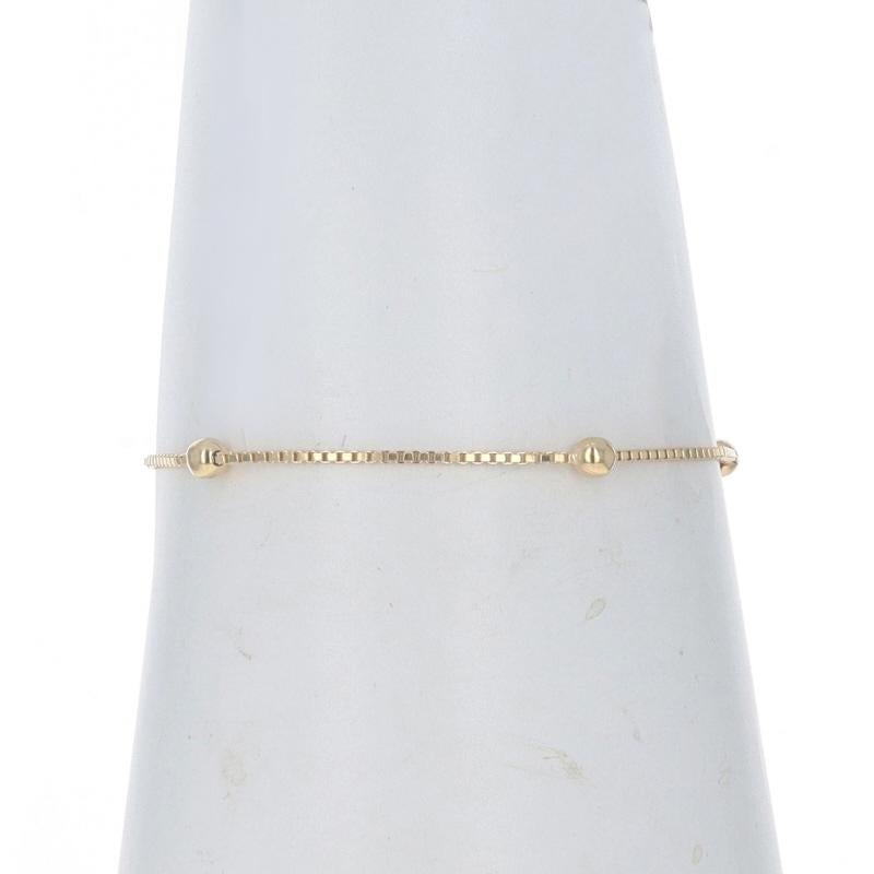 Contenu du métal : Or jaune 18k

Style de chaîne : Boîte
Style de bracelet : Chaîne de perles Station
Type de fermeture : Fermoir à anneau à ressort

Mesures

Largeur de la chaîne : 1/16