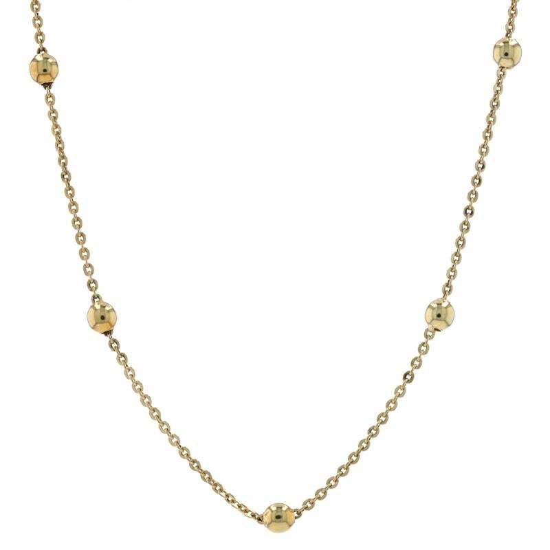 Metal Content: 14k Yellow Gold

Chain Style: Flat Cable
Necklace Style: Bead Station
Fastening Type: Spring Ring Clasp

Measurements
Length: 15 3/4