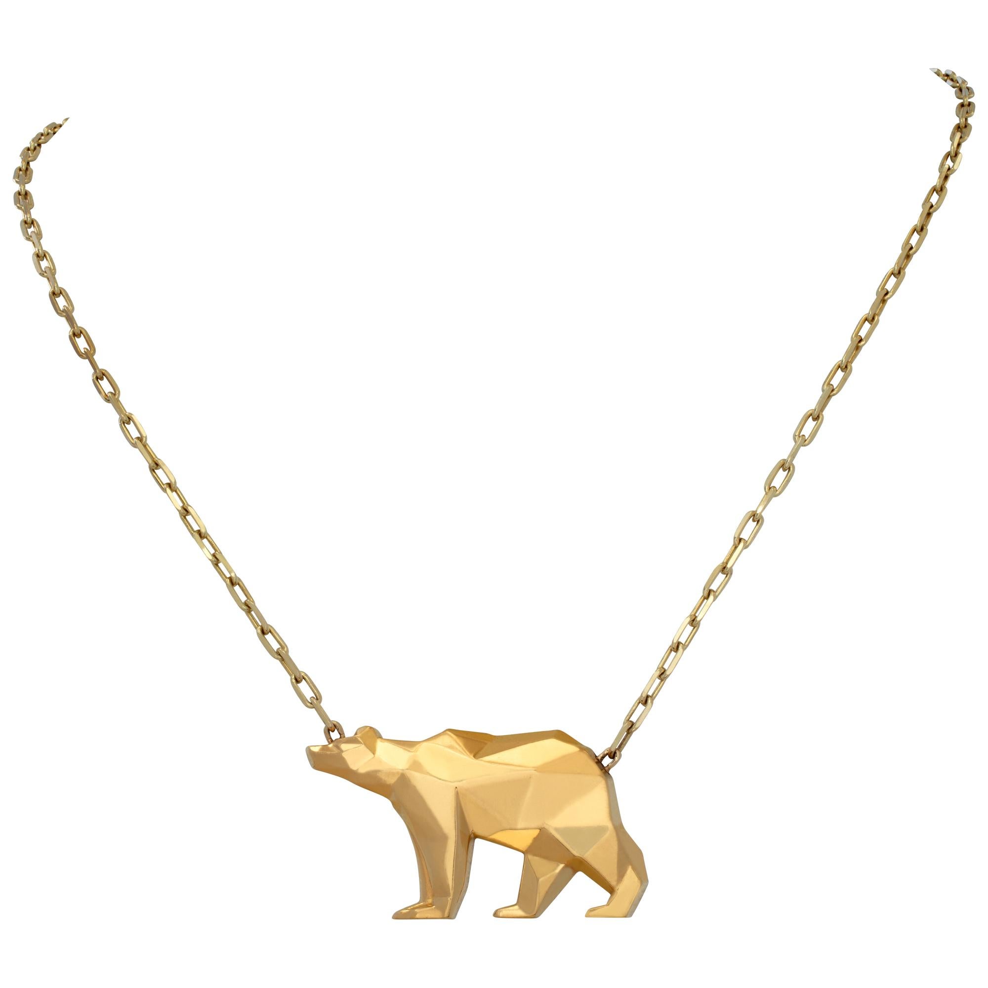 Bear pendant in 24k gold. Contains almost 1 oz of pure California .999 gold with 18k yellow gold chain. Limited edition No. 003. Measures 18 inches.
