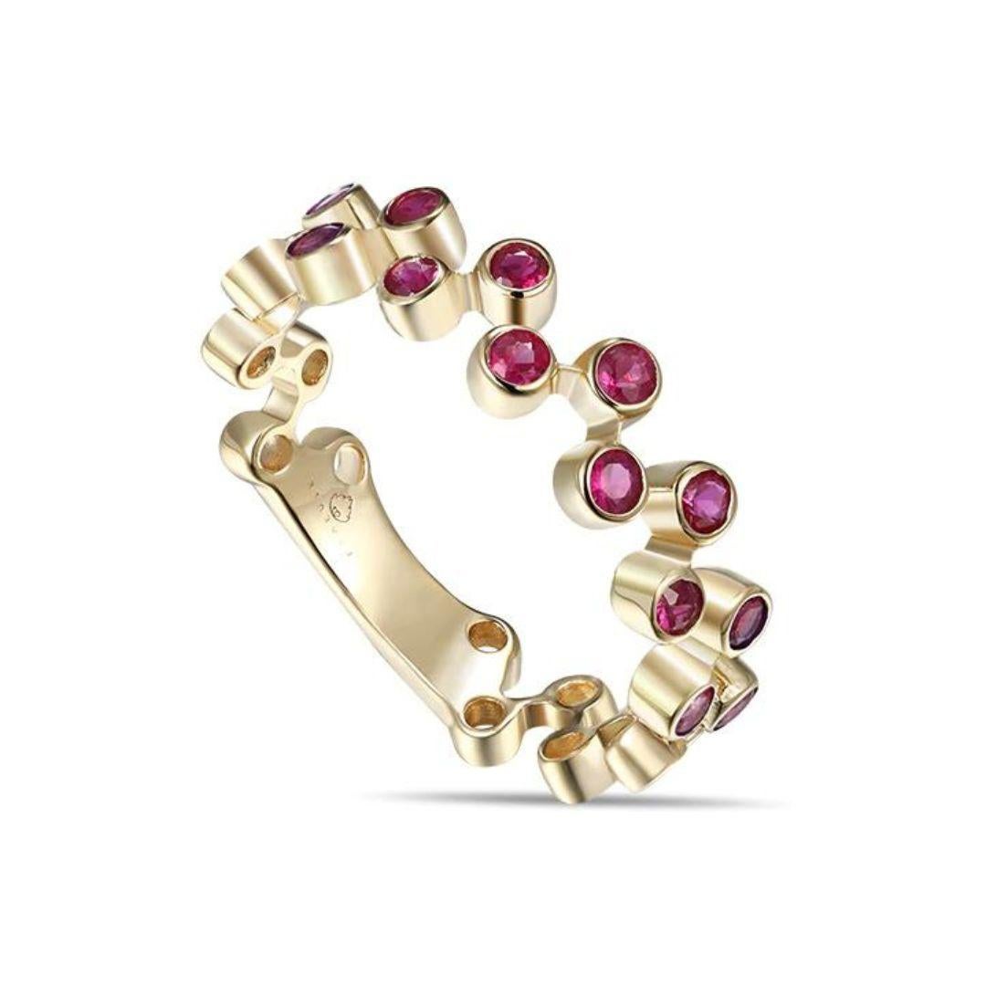 Yellow gold rubies fashion band with open space design. Use this ring as a stackable band to combine or complement other rings, as a one of a kind wedding band, anniversary gift, birthday gift for July or any other special occasion. Band contains