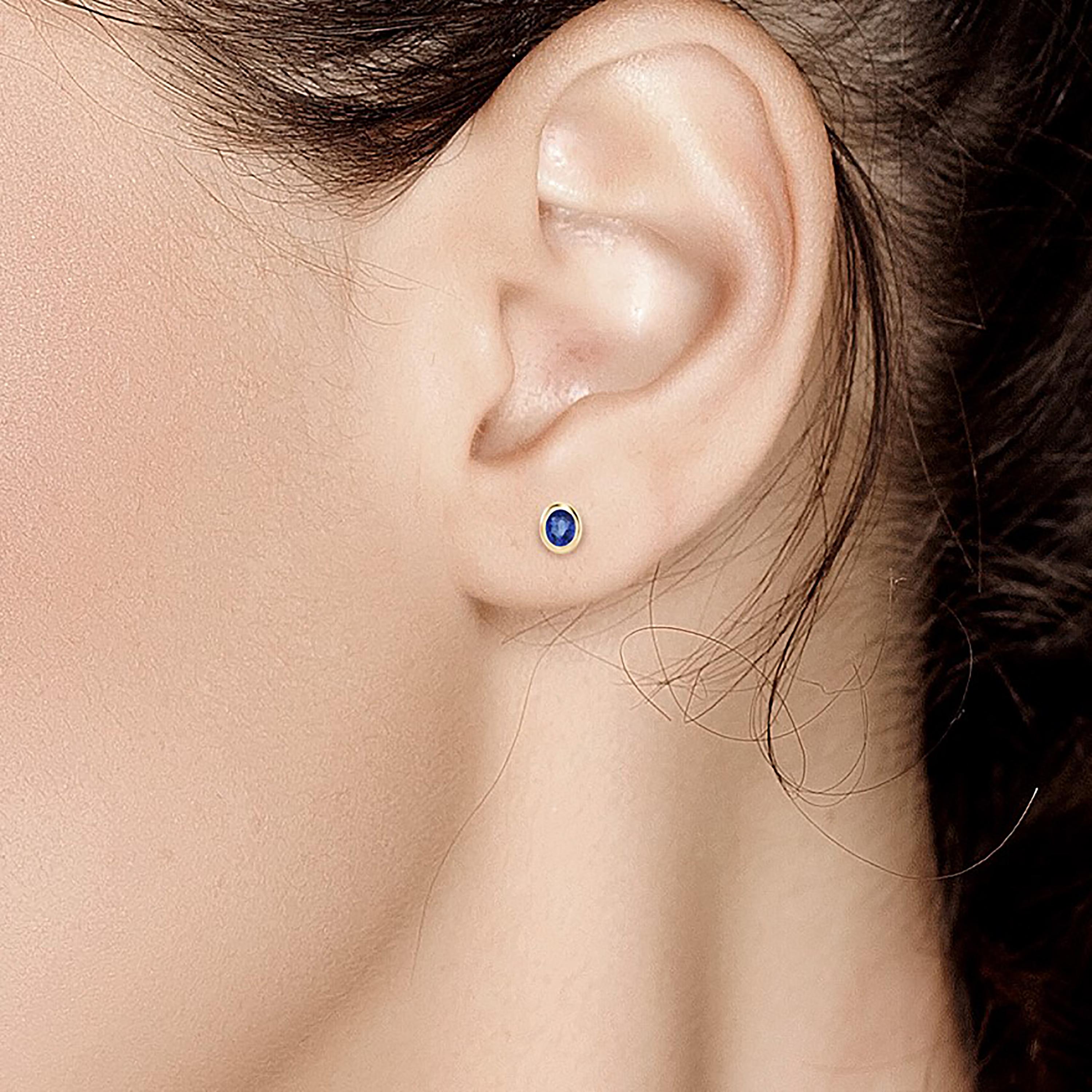 14 karats yellow gold oval shape blue sapphire stud earrings
Stud earrings measuring 5 by 4 millimeter; 
Two oval blue Sapphire weighing 0.30   
New Earrings
Handmade in USA
