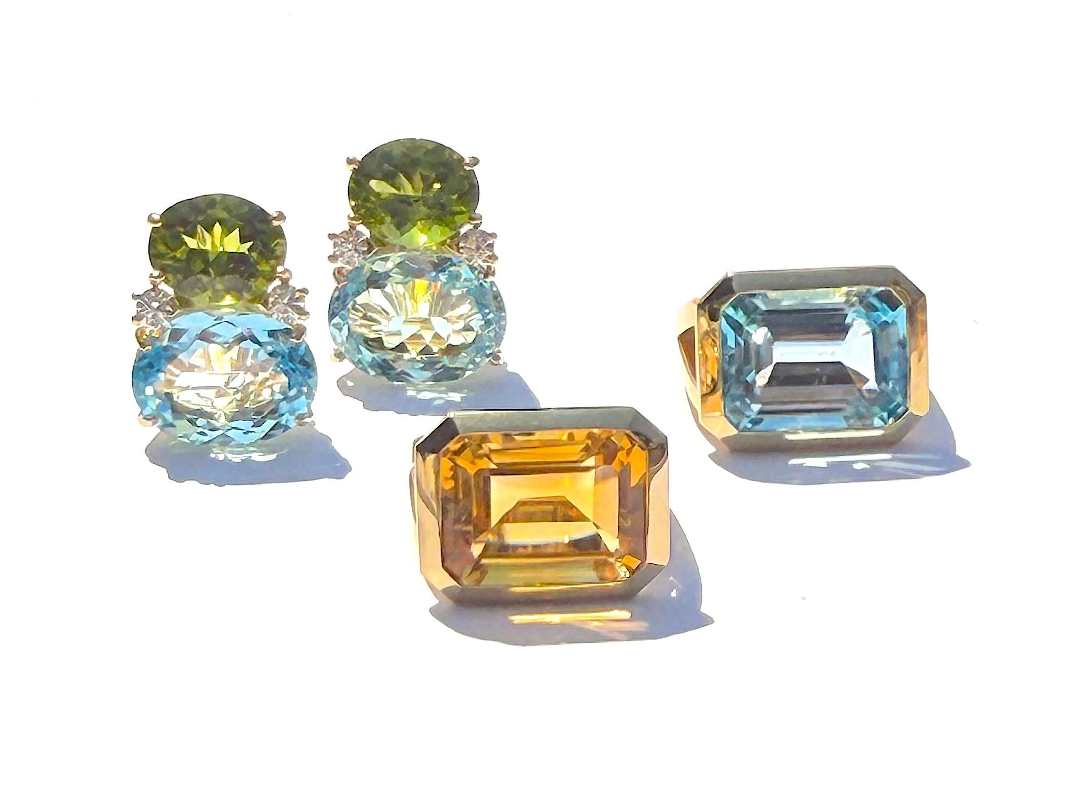 Ring aus Gelbgold mit Lünettenfassung, Iolith und grünem Granat umgeben im Angebot 9