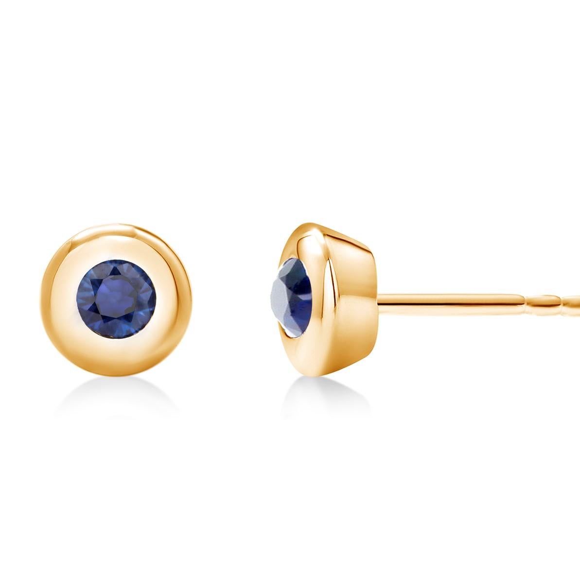 14 karat yellow gold round sapphire stud earrings
Two round sapphires measuring 3 millimeters each 
Sapphire hue tone color is cornflower blue
Sapphires weighing 0.30   
New Earrings
New Earrings
Handmade in the USA
The 14 karat gold earrings are