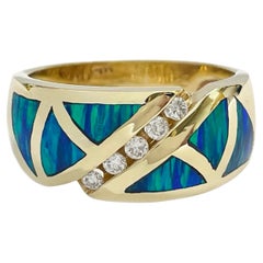 Ring aus Gelbgold mit schwarzem Opal und Diamant