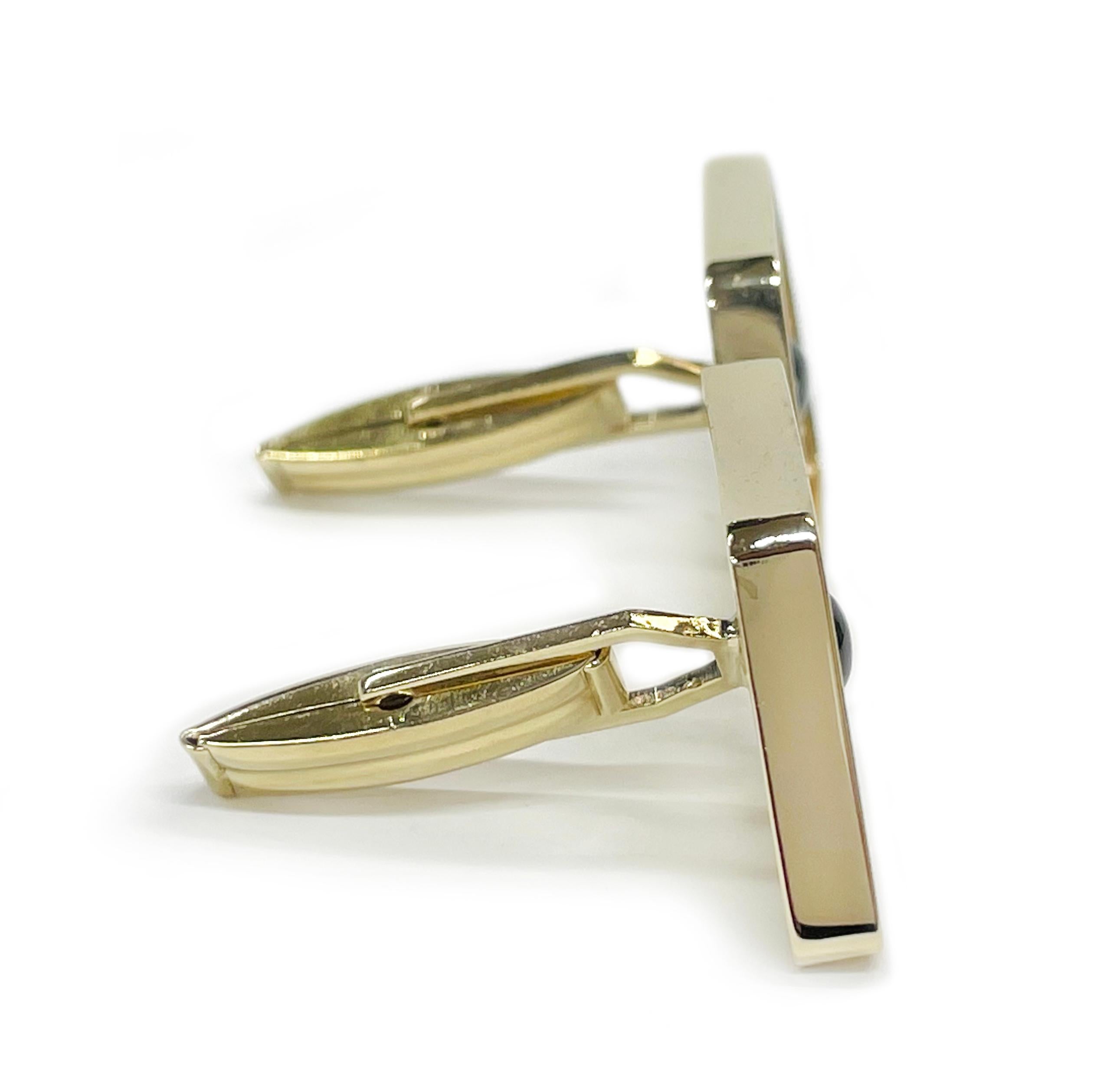 black and gold cufflinks