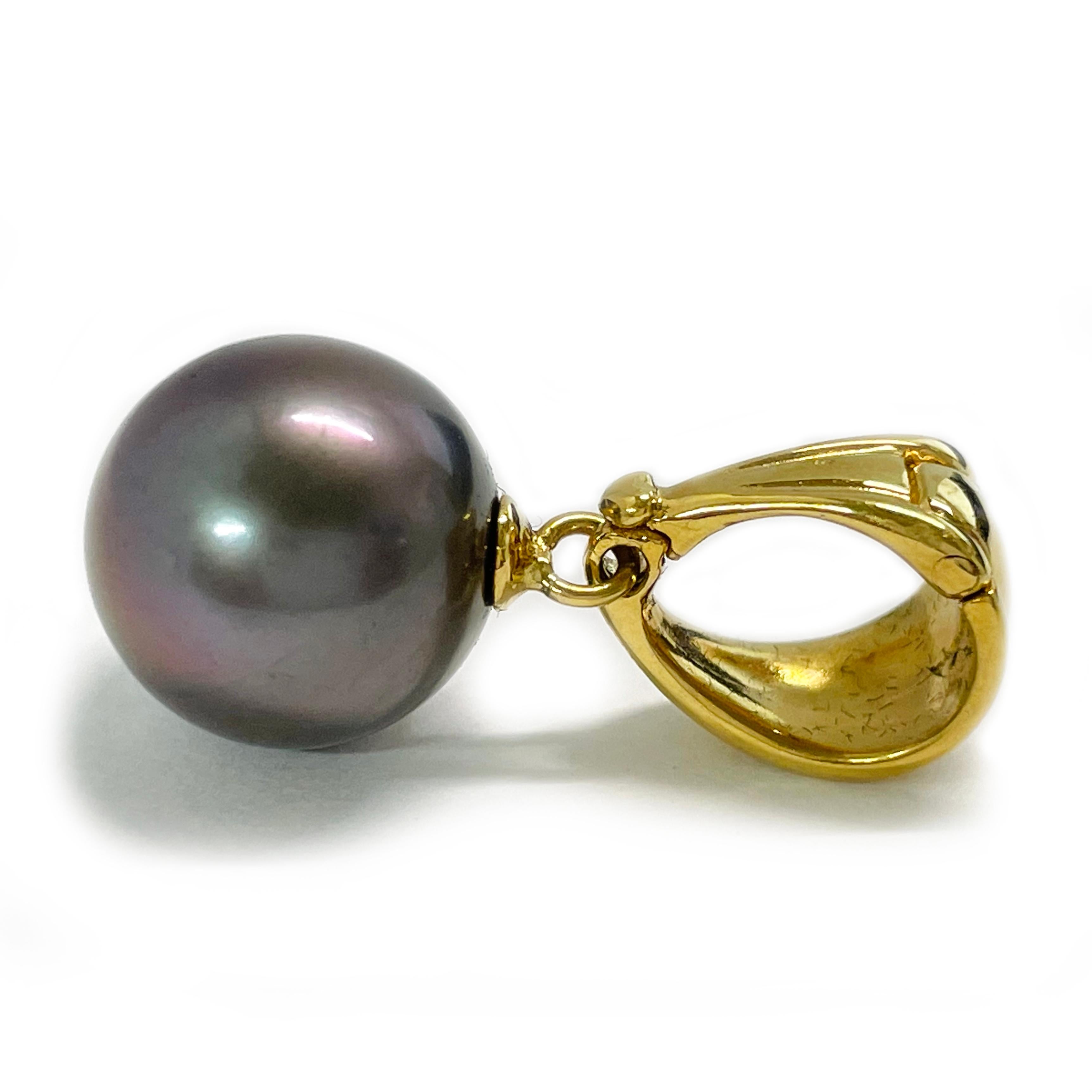 18 Karat Yellow Gold Black Tahitian Pearl Enhancer Pendant. The pearl measures 12.5mm and has good shape, luster with only minor blemishes. The pendant has an enhancer bail. The height of the pendant including bail is 26.3mm. The total weight of the