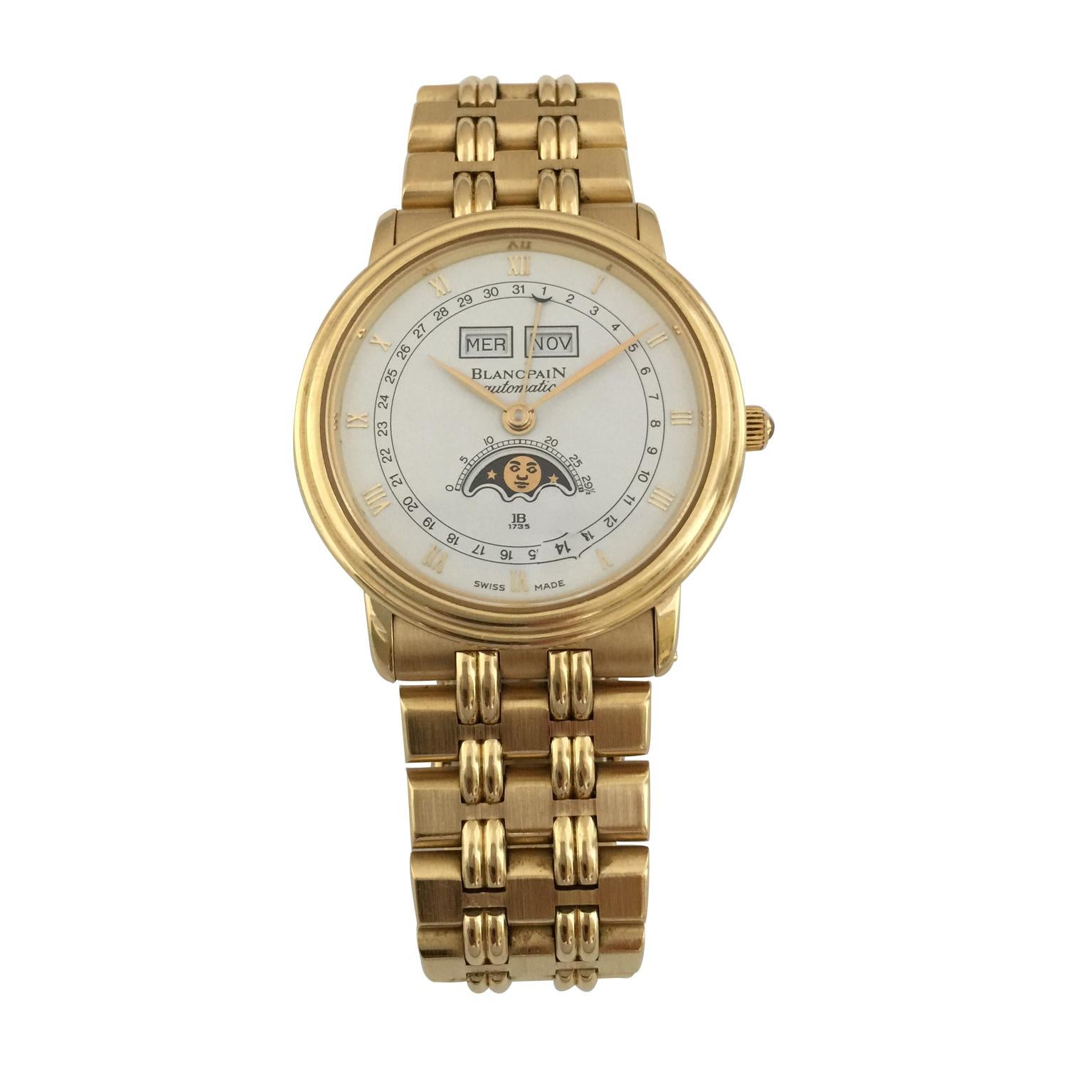 An 18k Yellow Gold Triple Calendar Moonphase Villeret Gents Wristwatch, moonphase aperture displayed at 6 0'clock, weekday and month displayed at 12 0'clock, inner date calendar chapter, centre calendar hand with a crescent tip, a polished 18k