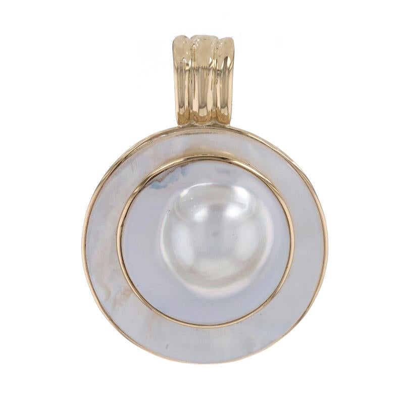 Metal Content: 14k Yellow Gold

Stone Information
Blister Pearl
Color: White

Style: Enhancer
Theme: Circles

Measurements
Tall (from stationary bail): 1 21/32
